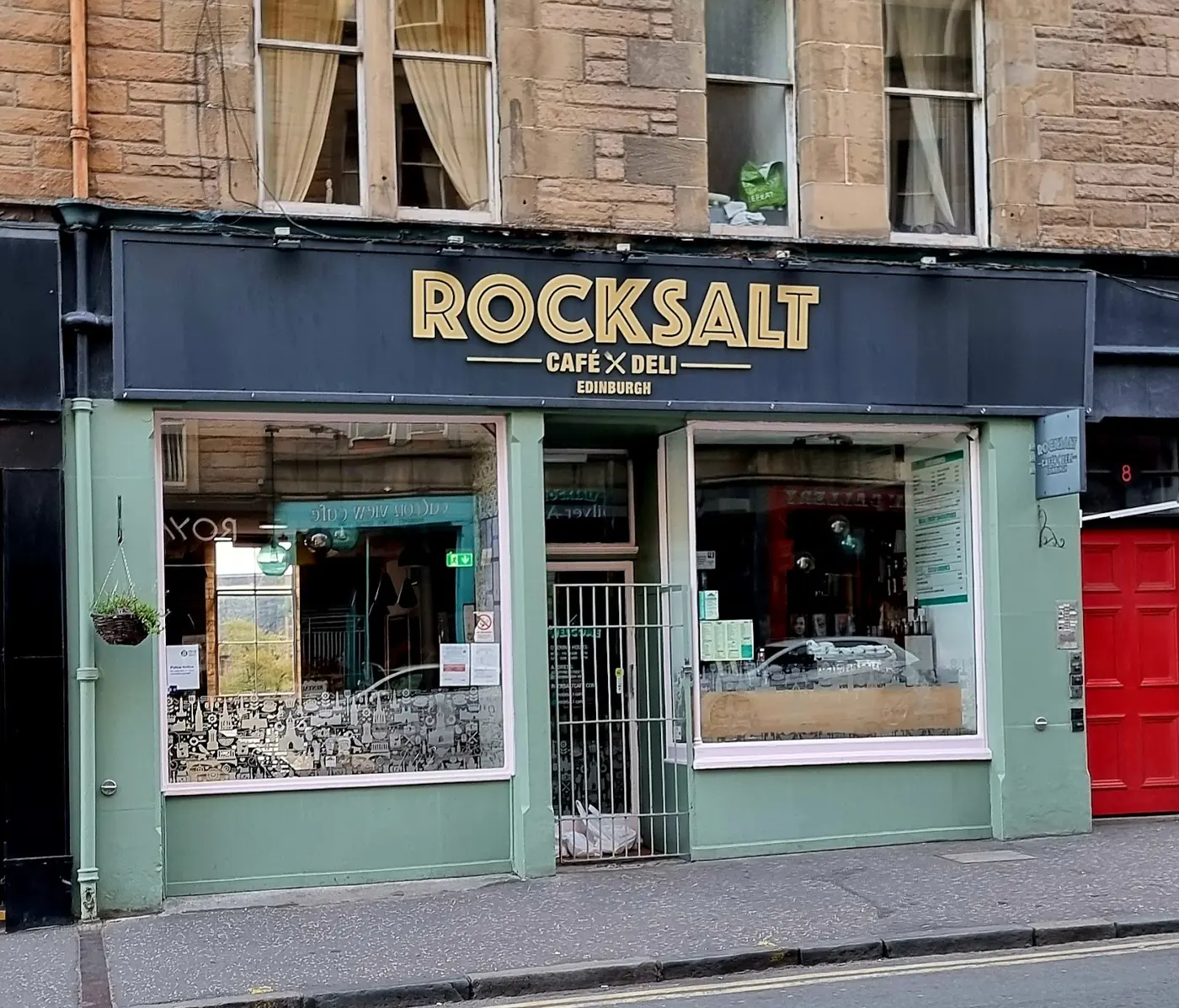 Rocksalt Cafe & Deli shopfront on Jeffrey Street — sage green frames, gold lettering on black
